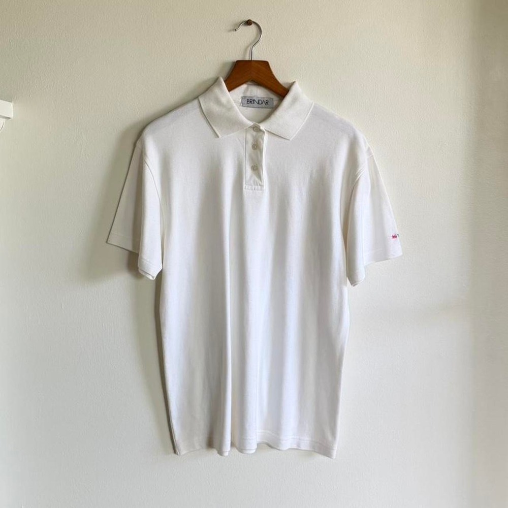 White Brindar polo shirt with floral embroidery. Size M
